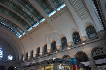 Photo for Paris, France - Sept. 2020 - Glass canopy and arched windows of the railway station of Paris-Est, also known as the Gare de l'Est, inside an ancient terminal built in Art Nouveau architecture - Royalty Free Image
