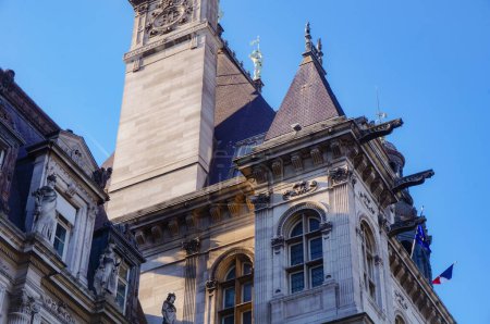 Photo for Paris, France - April 2020 - Detail of the Neo-Renaissance front facade of the 19th century palace that houses the City Hall of Paris, featuring a chimney marked with the acronym RF (French Republic) - Royalty Free Image