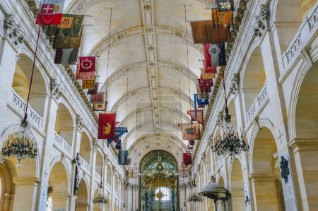 Photo for Paris, France - July 2019 - Inside the Cathedral Saint-Louis des Invalides, decorated with enemies' banners, formerly a royal chapel and now the seat of the Military Ordinariate to the French Army - Royalty Free Image