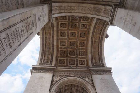 Photo for Paris, France - July 2019 - Triumph Arch (Arc de Triomphe) in Charles de Gaulle Square (also known as Place de l'toile), richly decorated with bas reliefs, notably the frieze under the attic - Royalty Free Image