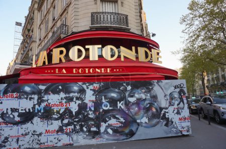 Photo for Paris, France - April 2021 - The luxury restaurant La Rotonde on Raspail Boulevard, barricaded with wooden boards ever since it has been under attacks for being a symbol of the Parisian elite - Royalty Free Image