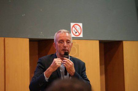 Photo for Toulouse, France - March 2023 - Ex-astronaut, Colonel Philippe Perrin, city and metropolitan councillor, at a debate on the low-emission zone (ZFE in French) of Toulouse organized by Reconquete! - Royalty Free Image