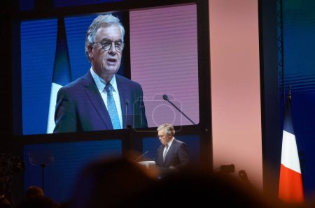 Photo for Reims, France - Feb. 5, 2022 - Jean-Paul Garraud's speech on big screen at Marine Le Pen's Presidential Convention ; he is a former anti-terror judge and the chairman of the regional RN's group - Royalty Free Image
