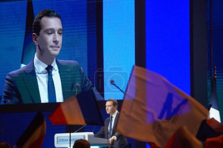 Photo for Reims, France - Feb. 5, 2022 - Jordan Bardella's speech on giant screen, at Marine Le Pen's Convention ; he is the chairman of the Rassemblement national and a member of the European Parliament - Royalty Free Image