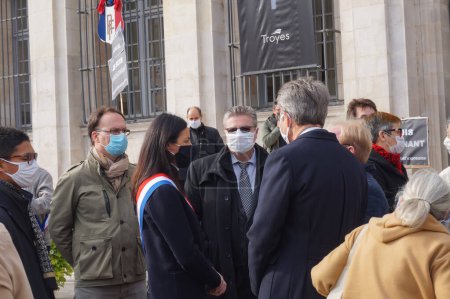 Photo for Troyes, France - Oct. 18, 2020 - Deputy Valerie Bazin-Malgras, Academy Director Frederic Babloin and officials, at a demonstration in tribute to Samuel Paty, a teacher beheaded by an islamist - Royalty Free Image
