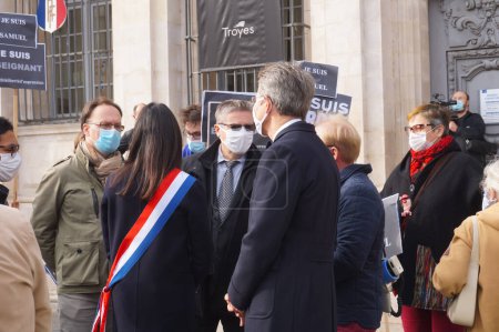 Photo for Troyes, France - Oct. 18, 2020 - Prefect of Aube Stephane Rouv, Academy Director and Education Inspector Frederic Bablon, and officials at the tribute to Samuel Paty, a teacher killed by a jihadist - Royalty Free Image