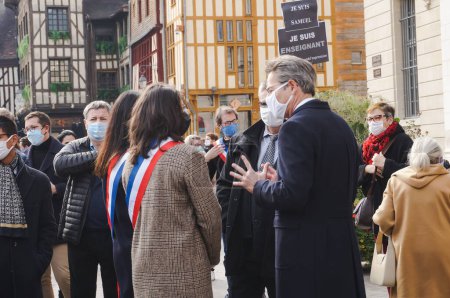 Photo for Troyes, France - Oct. 18, 2020 - Prefect of Aube Stephane Rouve and Academy Director Frederic Bablon talk with city councillors at the homage to Samuel Paty, a teacher butchered by an islamist - Royalty Free Image