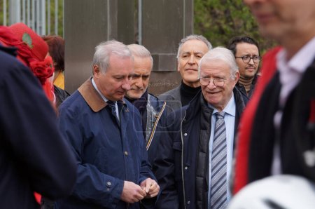 Photo for Toulouse, France - April 2023 - Mayor Jean-Luc Moudenc, CRIF Vice-Chair Roger Attali and Deputy Mayor Johnny Dunal unveil a new plaque at the Shoah Memorial, for the commemoration of Yom Hashoah - Royalty Free Image