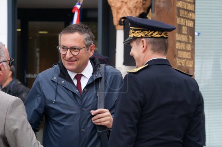 Photo for Toulouse, France - April 2023 - Member of the National Assembly, Representative of Haute-Garonne Jean-Francois Portarrieu, talks with Subprefect of Toulouse Serge Jacob, after an official ceremony - Royalty Free Image