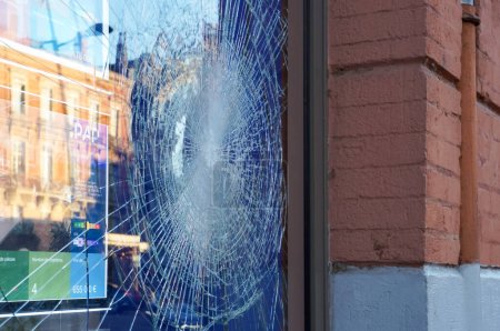 Photo for Toulouse, France - April 2023 - Scene of political violence: broken glass on a storefront in the city center, vandalized by far-left fringes amid social unrest over the government's pension reform - Royalty Free Image