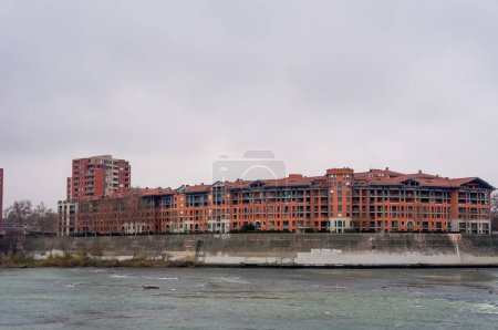 Foto de Toulouse, France - Feb. 2020 - The museum of Bazacle Cultural Centre, former facilities of a hydroelectric dam exploited by EDF (French electricity company), located by ford on the River Garonne - Imagen libre de derechos