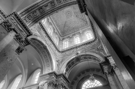 Photo for Toulouse, France - March 2020 - Low angle view of the richly worked baroque dome of Saint Peter of the Carthusian monastery (Saint-Pierre des Chartreux), featuring sculpted archs and ceilings - Royalty Free Image