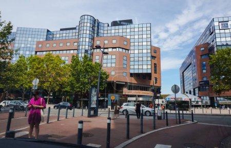 Photo for Toulouse, France - Feb. 2023 - Modern glass office buildings on the Esplanade of Lascrosses Boulevard, in the recent business district of Compans-Caffarelli, including LCL's local headquarters - Royalty Free Image