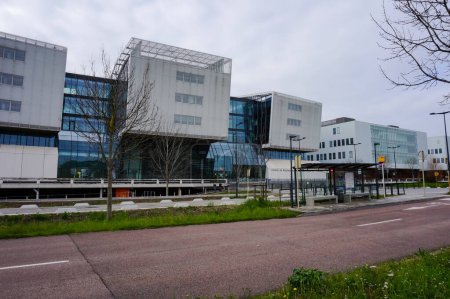 Photo for Toulouse, France -March 2020- Front of the Cancer Research Center of Toulouse (CRCT) in the Oncopole, jointly run by the CNRS, INSERM and Paul Sabatier University within the Cancer Bio Sant Cluster - Royalty Free Image