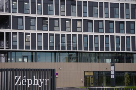 Photo for Toulouse, France - June 1, 2023 - Modern glass facade of Zephyr, a business center that houses several technology companies in the aerospace industry, on the new Montaudran Innovation Campus - Royalty Free Image