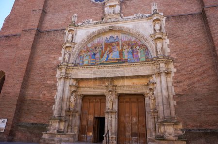 Photo for Toulouse, France - March 2020 - Renaissance portal and painted porcelain tympanum of the church Notre-Dame de la Dalbade, in the historic quarter of Carmes, featuring the crowning of the Virgen - Royalty Free Image