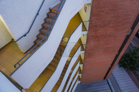 Photo for Toulouse, France - July 2020 - Top view above the staircase of Carmes Indigo's above-ground car park, composed of superimposed stairs built one above another, over the different floors of the building - Royalty Free Image