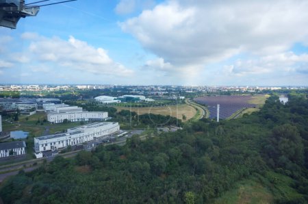 Photo for Toulouse, France - June 3, 2023 - Panoramic view from Tlo aerial tram: from left to right, Oncopole, Pierre Fabre research center, the solar power plant and the smaller arm of the Garonne River - Royalty Free Image