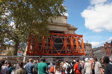 Photo for Toulouse, France - Aug. 31, 2023 - Structure relocation of Franois Verdier Memorial for the construction of metro Line C: the monument after its 90-degree rotation, enclosed in a metal exoskeleton - Royalty Free Image