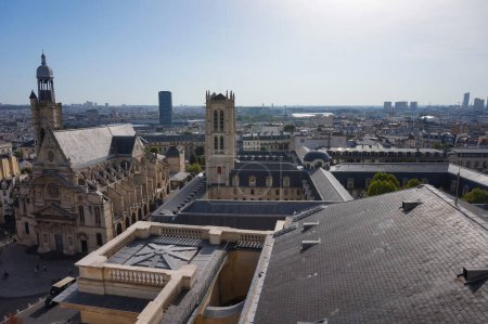 Photo for Paris, France - Sept. 5, 2023 - Aerial view from Panthon Dome on Lyce Henri IV and Saint-Etienne-du-Mont Church, on Sainte-Genevive Mount, in the Latin Quarter; both buildings have a bell tower - Royalty Free Image