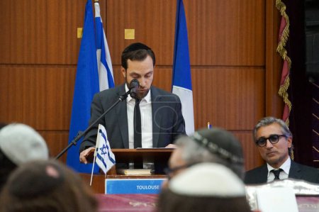 Photo for Toulouse, France - Oct. 14, 2023 - Hamas terror attacks against Israel: consistorial rabbi Doron Nam's preaching during the special ceremony held at Hekhal david Synagogue in homage to the victims - Royalty Free Image