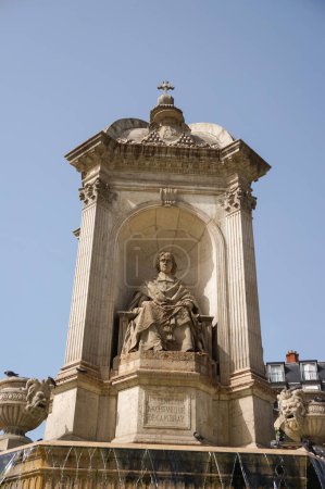 Photo for Paris, France - Sept. 5, 2023 - Detail of the fountain on Saint-Sulpice Square: the sculpture pictures 17th century Archbishop Fnlon, who was a French clergyman and scholar under King Louis XIV - Royalty Free Image