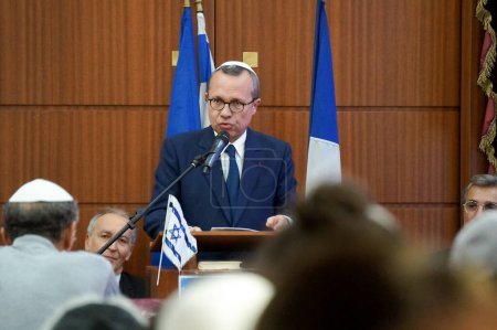 Photo for Toulouse, France - Oc. 12, 2023 - Hamas terrorist attacks in Israel: Prefect of Occitanie Pierre-Andr Durand, representing the government, gives a speech in tribute to the victims at the synagogue - Royalty Free Image