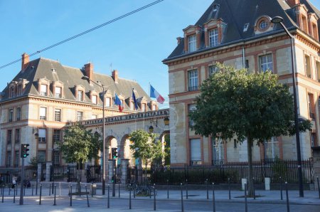 Photo for Paris, France - Sept. 6, 2023 - Monumental entrance, with flags adorning the arcade, of the International University City of Paris (CIUP, "Cit internationale universitaire de Paris"), on Jourdan Bd. - Royalty Free Image