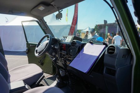 Photo for Chlons-en-Champagne, France - Sept. 9, 2023 - Driver's seat inside a Masstech T4, an all-terrain vehicle based on the Toyota Land Cruiser and transformed by French manufacturer Technamm for the Army - Royalty Free Image