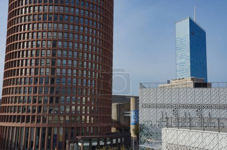 Photo for Lyon, France - Nov. 24, 2023 - In the forefront, the round LCL Tower (aka "le Crayon", the Pencil) and Westfield Shopping Mall in Part-Dieu CBD; in the background, the Auditorium and Incity Tower - Royalty Free Image