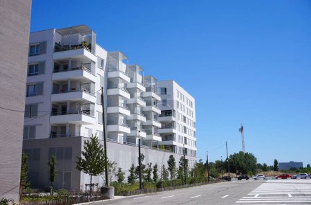 Photo for Toulouse, France - Aug. 9, 2023 - Modern, white residential building by the Giants' Runway ("Piste des Gants"), Aropostale's historic airstrip in the new neighborhood of Montaudran Aerospace - Royalty Free Image
