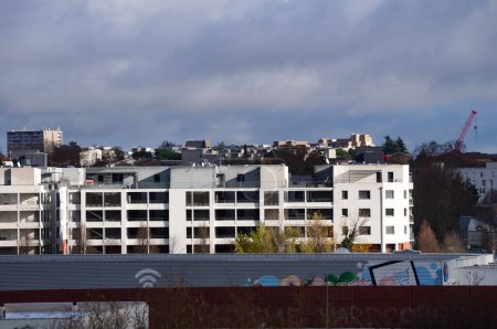 Photo for Toulouse, France - Dec. 21, 2023 - Recent, modern white apartment buildings by the Giants' Runway ("Piste des Gants"), historical airstrip of the Aropostale, in Montaudran Aerospace District - Royalty Free Image