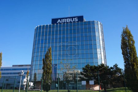 Photo for Toulouse, France - Dec. 2, 2023 - Office tower of Airbus Defence and Space on the industrial site of Le Palays, near Labge, where 4,400 employees design and manufacture satellites and spacecrafts - Royalty Free Image