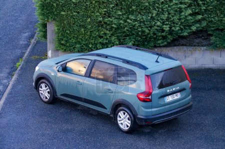 Photo for Aveyron, France - March 10, 2024 - Top view on a brand-new Dacia Jogger in a parking lot; it is a 7-seater, station wagon MPV manufactured in Romania by French automotive group Renault-Nissan - Royalty Free Image