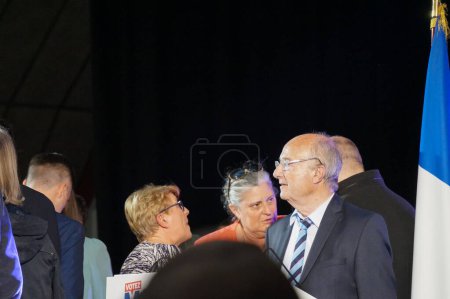Photo for Palavas-les-Flots, France - April 6, 2024 - Member of the European Parliament, vice-president of Reconqute! Nicolas Bay, ex-mayor of Orange Jacques Bompard and other party executives at a rally - Royalty Free Image