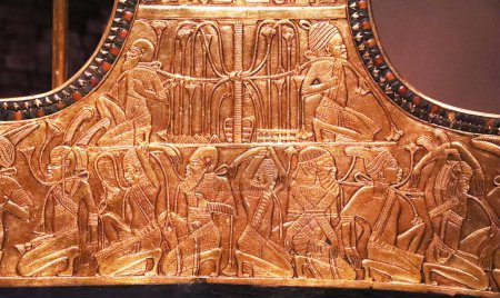 Photo for Golden bas-relief with the defeated enemies of the king from Tutankhamun's tomb - Royalty Free Image