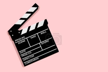 Photo for Movie clapperboard for shooting videos and movies on a powdery background copy space - Royalty Free Image