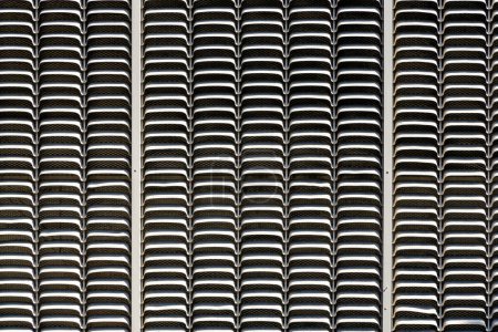 Photo for Abstract pattern background of ventilation grille. Ventilation grids on wall of building, outdoors. Architectural background of urban modern industrial ventilation grille. Lattice shutters vent cover - Royalty Free Image