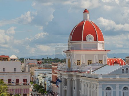Cienfuegos, Cuba, 13 JAN, 2022 - Central Marti square wit red dome palace. Palacio de Gobierno (City Hall), Cienfuegos, Cuba.