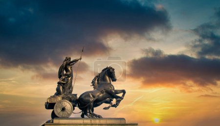 Statue of Boadicea Boudicca Queen at sunset in London, UK