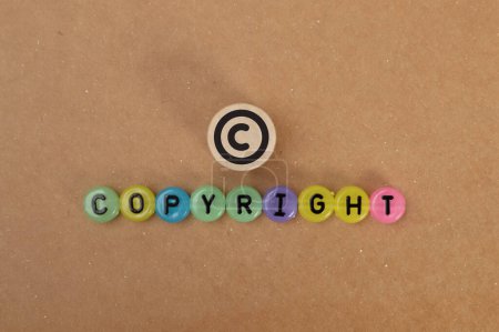 Photo for Alphabet beads with text COPYRIGHT and letter C. - Royalty Free Image