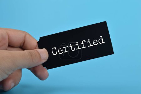Photo for Black card written with CERTIFIED. Having a certified professional gives clients the assurance and confidence that they are working with someone who has undergone rigorous training - Royalty Free Image