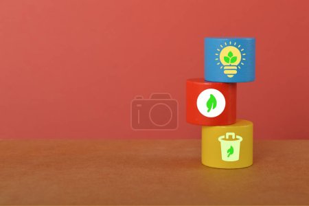 Photo for Colorful wooden block with sustainable energy symbols. - Royalty Free Image