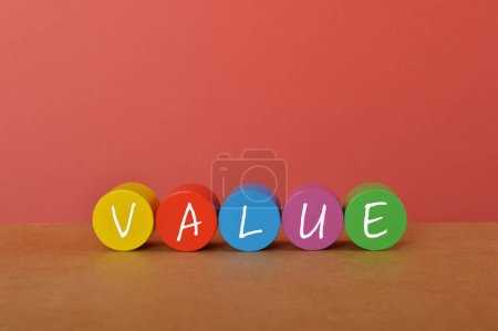 Photo for Colorful wooden blocks with text VALUE. Cost of goods sold concept. - Royalty Free Image