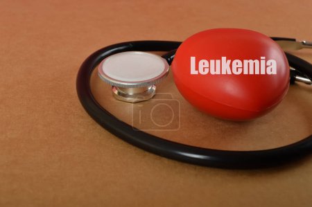 Photo for Stethoscope and heart with text LEUKEMIA. Leukemia is a type of cancer that affects the blood and bone marrow, where blood cells are produced. - Royalty Free Image