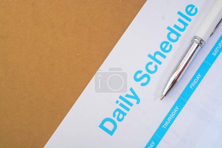 Photo for A close-up view of daily schedule text representing the daily routine matters. - Royalty Free Image