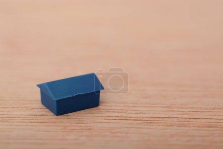 Photo for Tiny home model on wooden table. Real estate concept. - Royalty Free Image