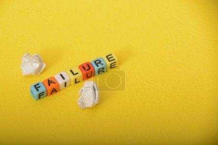 Photo for Close-up shots of creatively arranged letters forming words related to the FAILURE - Royalty Free Image
