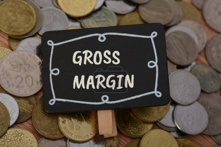 Photo for Gross margin is a financial metric that measures a company's profitability by assessing the profitability of its core business activities - Royalty Free Image