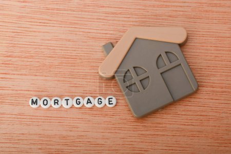 Photo for A home mortgage, often referred to simply as a mortgage, is a specific type of loan that is used to purchase or refinance a residential property - Royalty Free Image